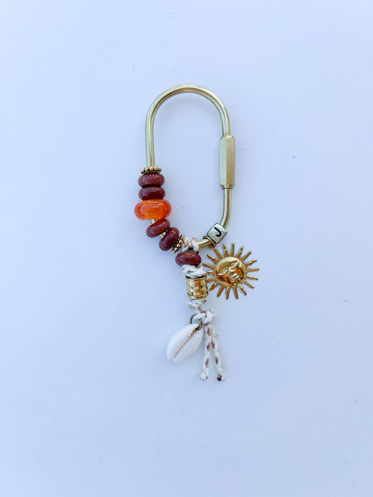bag charm mit sonne
