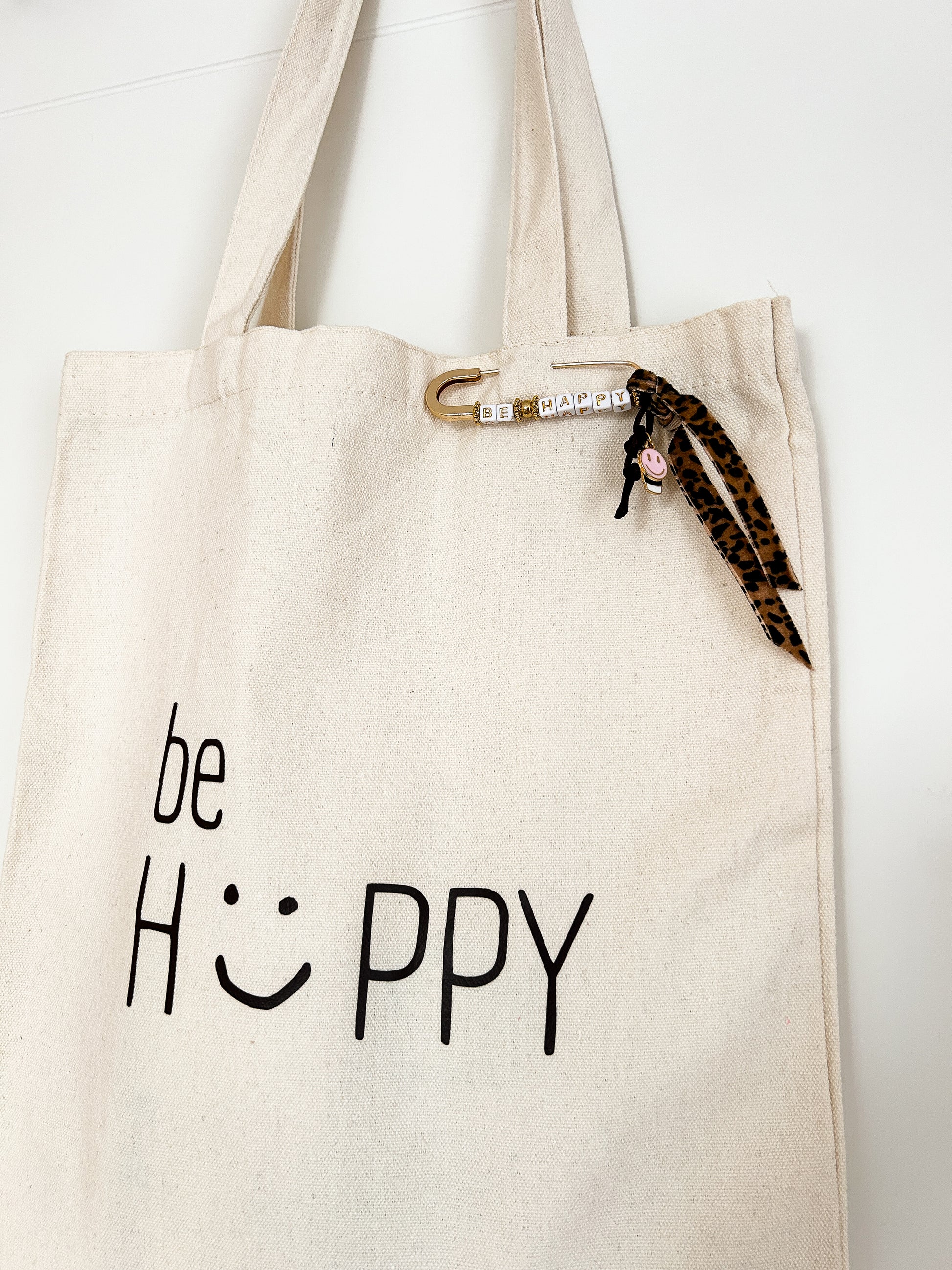 stofftasche mit Motiv und Taschenanhänger "Be Happy"
